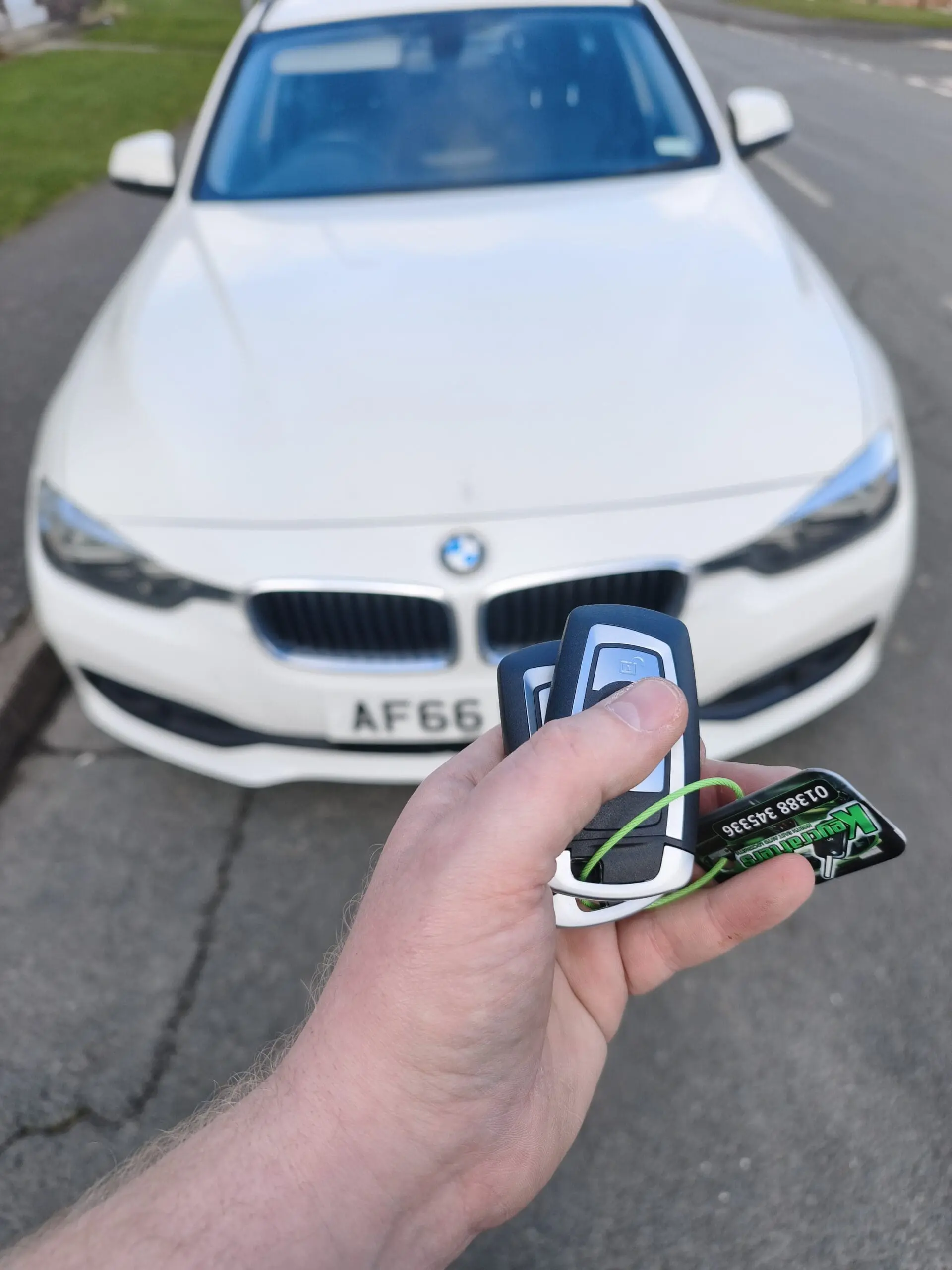 BMW 3 Series spare key cut and coded outside customer's home